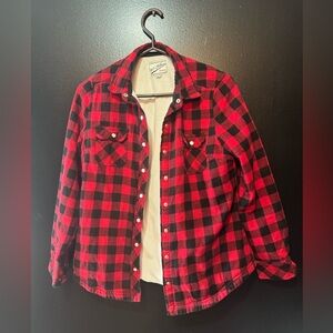 Cute plaid shirt body is lined and very soft, only lined on body not on arms.